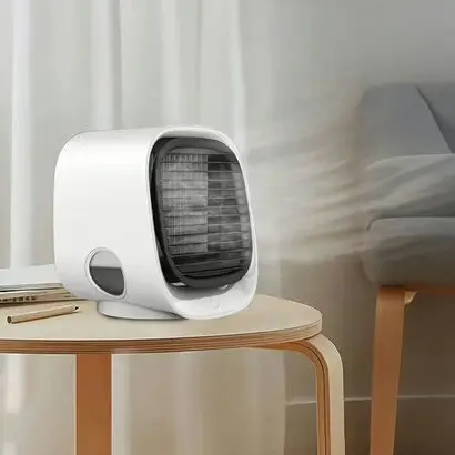 AiraBreeze Avis 2026 : guide pour se maintenir au frais sans dépenser beaucoup 2 AiraBreeze test sur un bureau
